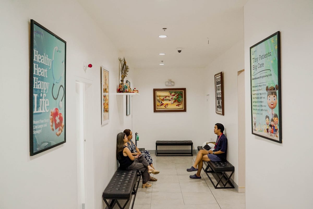 Patient support desk with chairs in a Mayon clinic service area